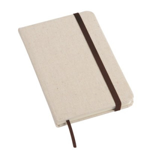 Notebook WRITER: in DIN A6 size with rounded corners: elastic strap to close and integrated bookmark, surface in a noble canvas look, 80 pages, lined, 70g/m²